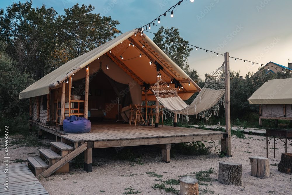 Glamping tent in the forest. Luxury tent sea view. Nature green tourism Glamping tent in the forest. Luxury tent sea view. Nature green tourism