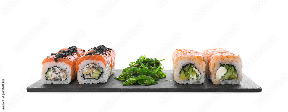 Delicious sushi rolls and chuka on white background Delicious sushi rolls and chuka on white background