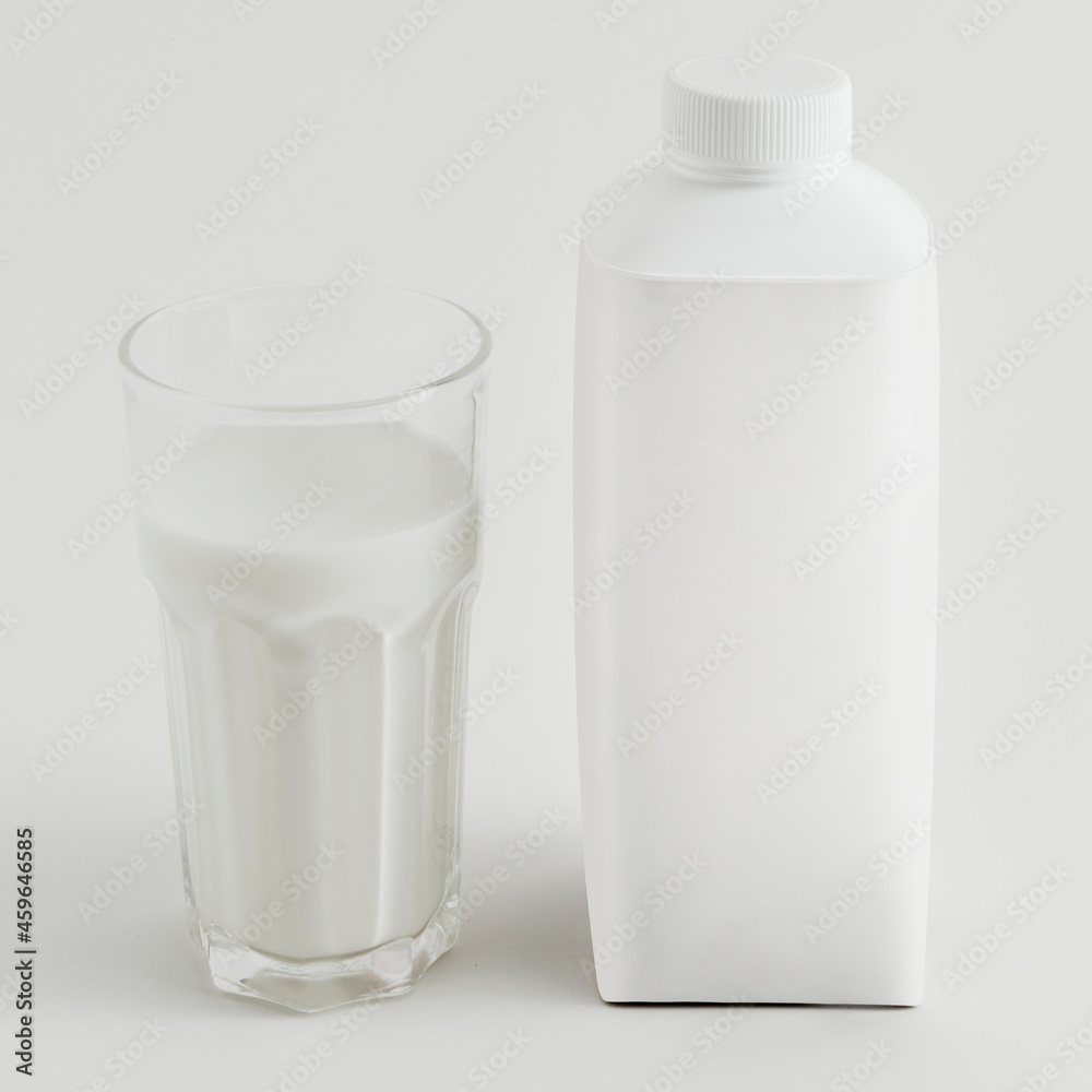 Fresh milk in a glass with a bottle Fresh milk in a glass with a bottle