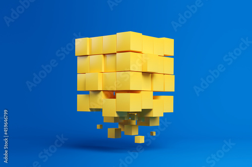 Three dimensional render of bunch of yellow cubes floating against blue background photo