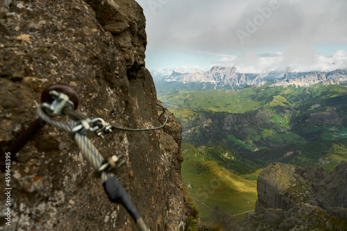 View from the famous via ferrata Trincee in the italain Dolomites with a shiny new steel cable photo