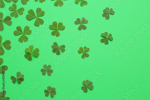 Beautiful clover on green background, flat lay
