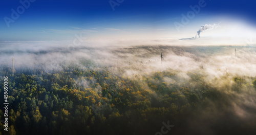 nature and industry - misty landscape from above with you on the power station photo