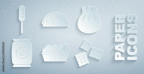 Set Chicken nuggets in box, Khinkali on cutting board, Bag or packet potato chips, Cracker biscuit, Taco with tortilla and Fried sausage icon. Vector