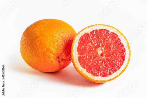 Grapefruit whole and half on white. Citrus fruit. Fresh healthy food.