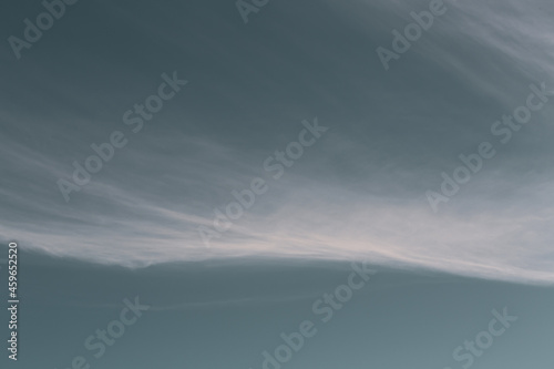close up of white cloud on petrol blue sky background