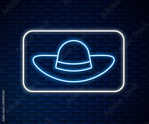 Glowing neon line Elegant women hat icon isolated on brick wall background. Vector