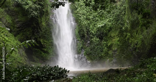 Tagbo Falls tropical rainforest pool Volta Ghana Africa. Waterfall Mount Afadjato, Ghana highest mountain. Eastern Region border of Togo. Hike through cocoa plantation, forest and tropical rainforest. photo