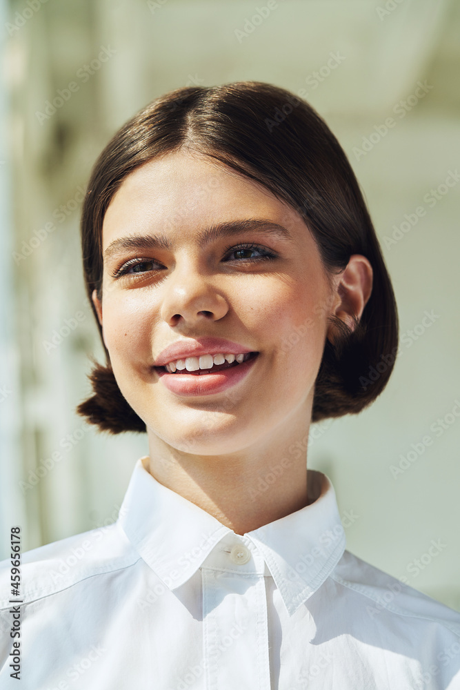 Happy teenager girl in white shirt in sunlight Happy teenager girl in white shirt in sunlight