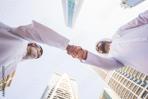 Photography Businessmen handshaking after a successful business deal