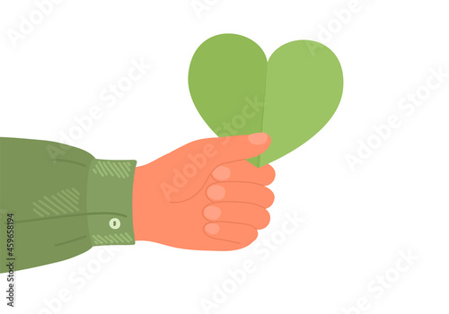 Hand holding green heart. Eco, environment protection, organic concept.