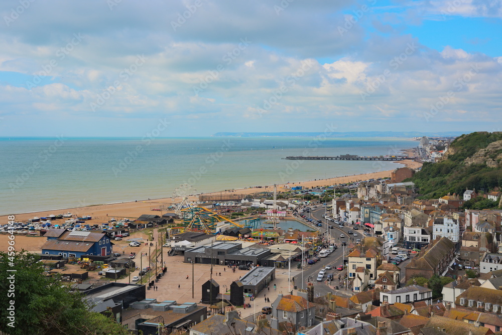    View to the seaside town, the sea and the pier from the cliff.