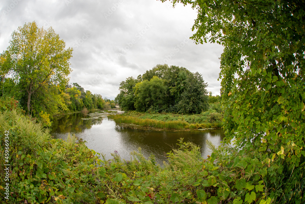 Fototapeta premium View of the Brochets river in the heart of the city of Bedford in Quebec