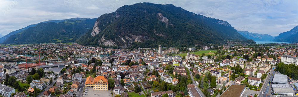 Aerial view around the old town of the city Interlaken in Switzerland on an afternoon in summer.