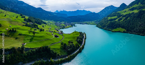 Aerial view around the lake Lungernersee in Switzerland on a sunny day in summer. 