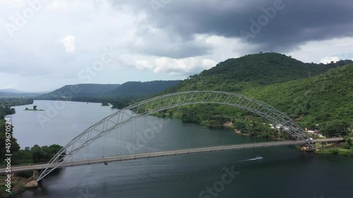 Aerial Adome bridge Volta River Ghana Africa part 2. Main river system in West African country of Ghana. Akosombo dam generating hydroelectricity. Largest man made reservoir by area in the world. photo