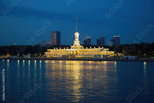 Brightly illuminated evening building of the Northern River Station. Built in 1937. Opened after reconstruction in 2020. Moscow  Russia