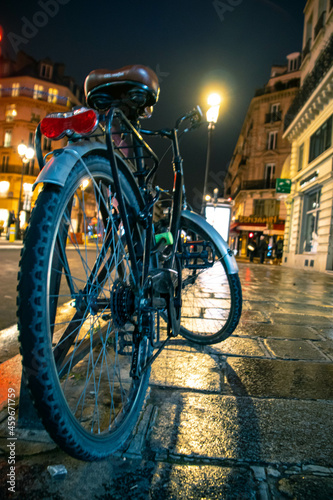 Bike on sidewalk at night in the city © matthias