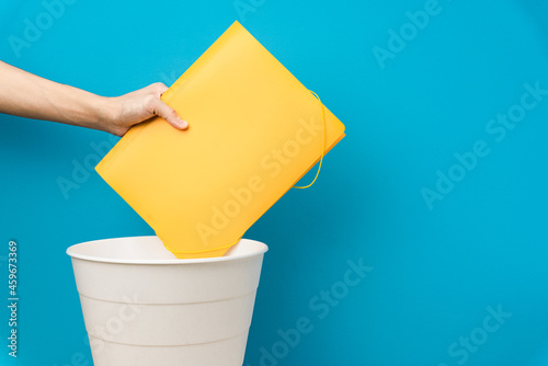 The documents is thrown into the trash for disposal