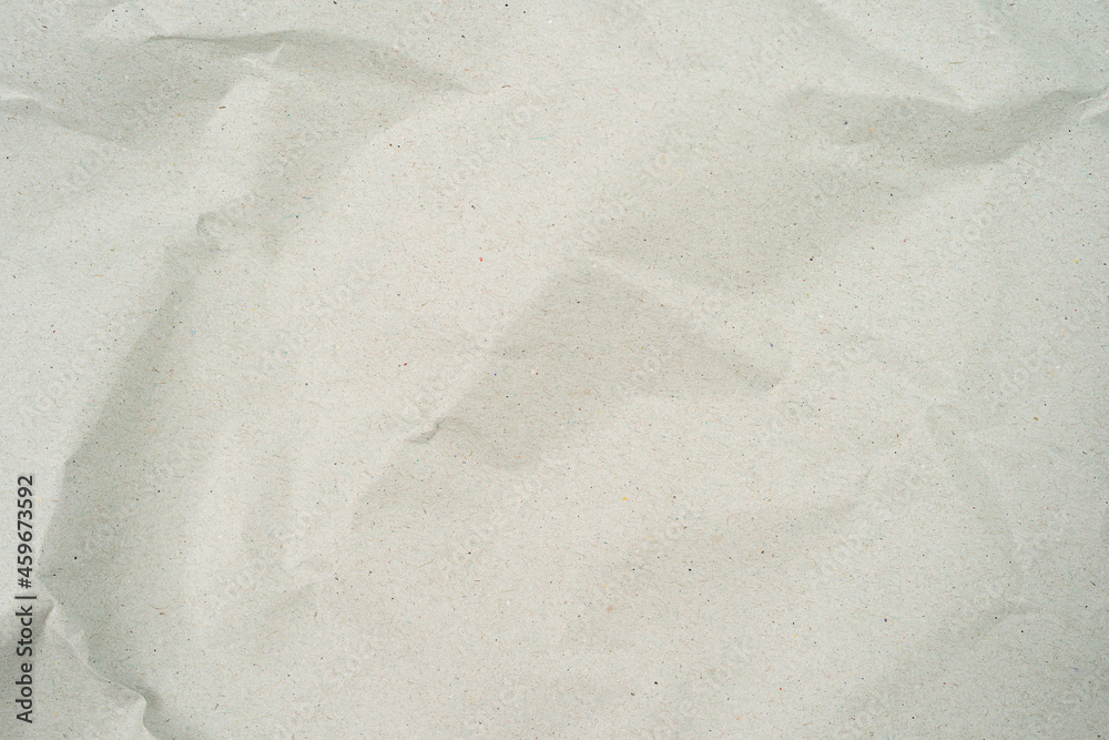 Naklejka premium grey crumpled kraft background paper texture