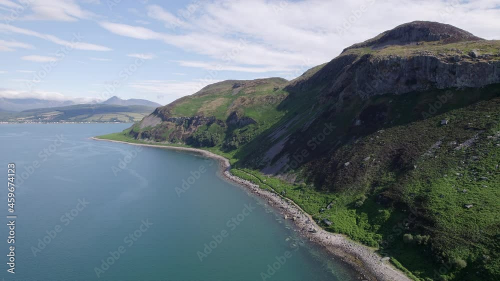 The Scottish Holy Isle with Mountainous and Coastal Landscape The Scottish Holy Isle with Mountainous and Coastal Landscape