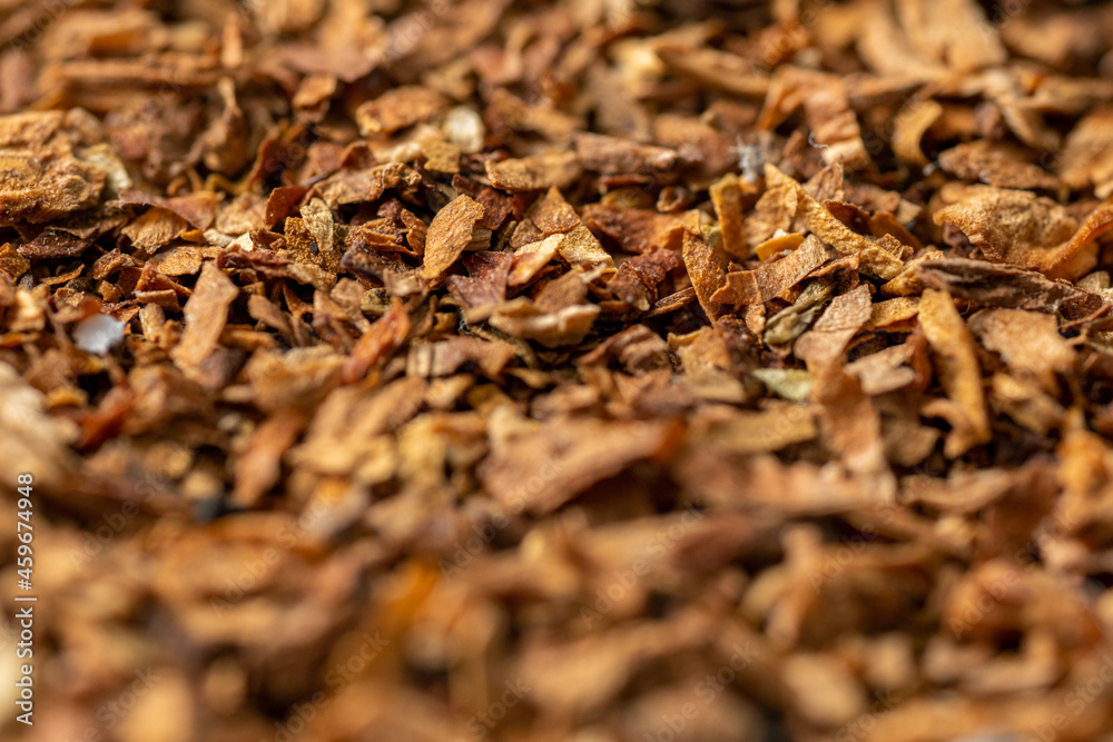 Pile of tobacco with close-up. Smoking tobacco