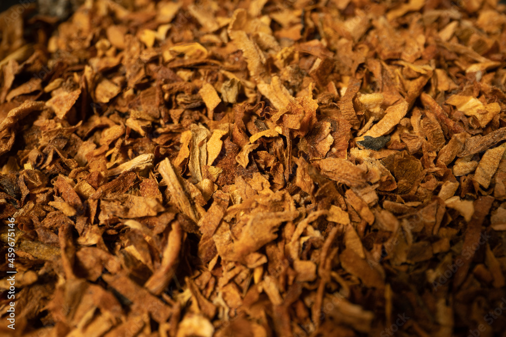 Pile of tobacco with close-up. Smoking tobacco