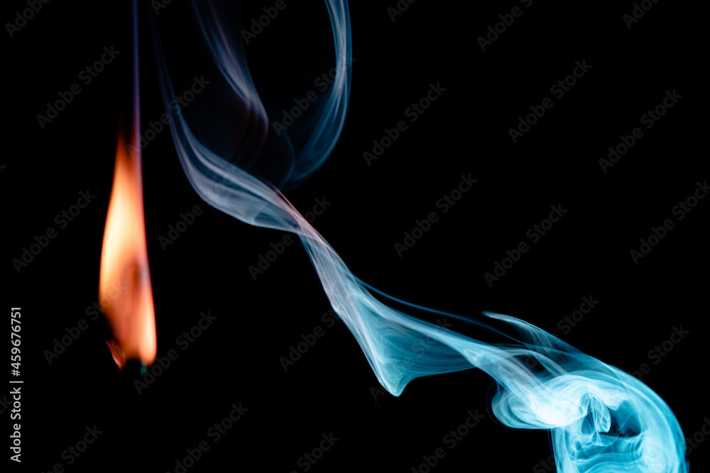 Abstract colorful smoke on a black background. Isolated.