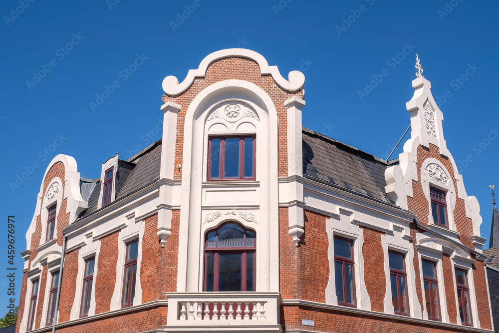 View to a beautifully decorated typical house facade in Norden / Germany in East Friesland 