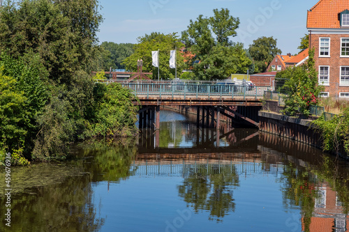 Reflection of the bridge over the Norder Tief in Norden / Germany in East Friesland on the North Sea  photo
