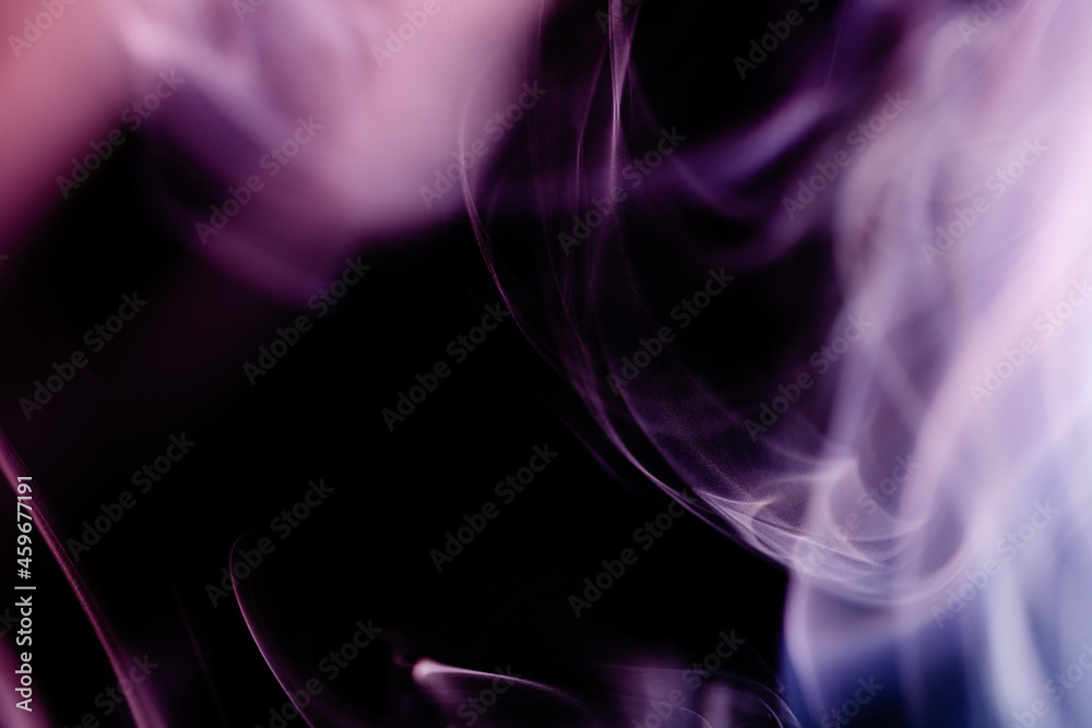 Abstract colorful smoke on a black background. Isolated.