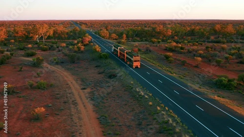 Aerial View of a Road Train passing by on Stuart Highway - Northern Territory, Australia photo
