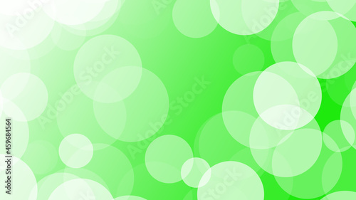 Colorful bokeh of light on green background