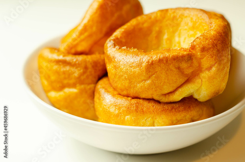 Traditional English Yorkshire pudding, wonderfully crisp and golden baked for a traditional recipe, accompaniment for the perfect Sunday roast