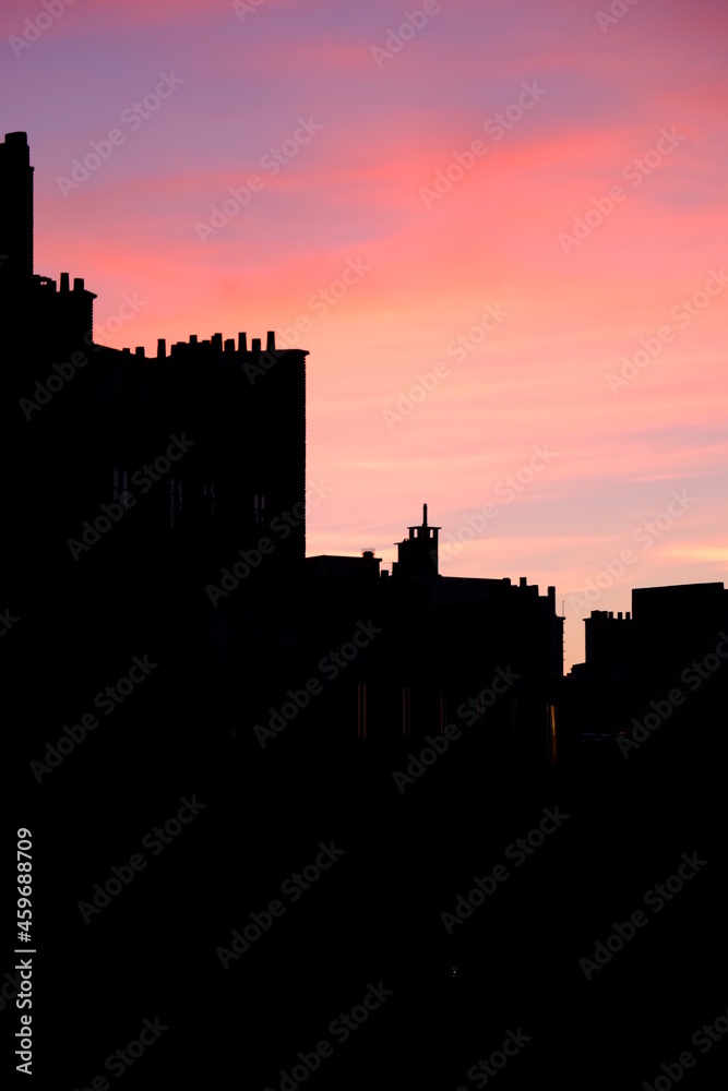The silhouette of some Parisian buildings during the sunset. Paris, Daumesnil metro station, September 22th 2021. France