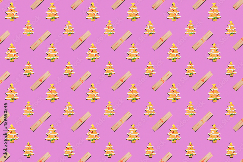 Seamless New Year's pattern from gift tied with thread and Christmas tree toy in form of spruce tree made of cookies on pink background Seamless New Year's pattern from gift tied with thread and Christmas tree toy in form of spruce tree made of cookies on pink background