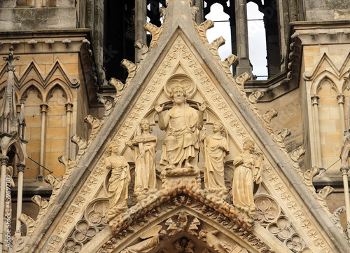 Ornament At The Entrance Of The Beautiful Roman Cathedral Basilique Saint-Remi Of Reims In France