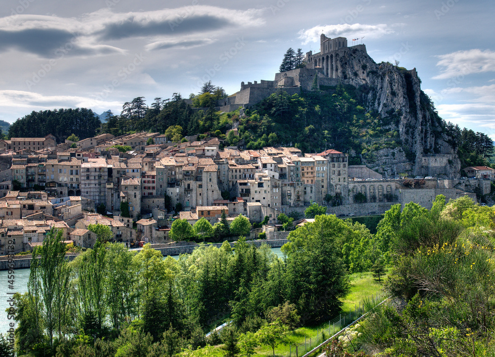 View To The Fortress Of Sisteron High Above The Old Town At The River Durance In France On A Beautiful Spring Day With A Clear Blue Sky France On A Beautiful Summer Day With A Few Clouds In The Sky