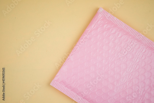 Pink envelope made of bubble wrap for prevent something from bumping or shockproof