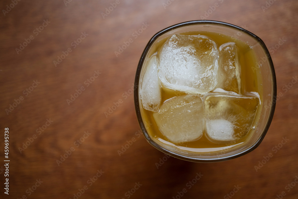 Alcoholic cocktail with ice and whiskey