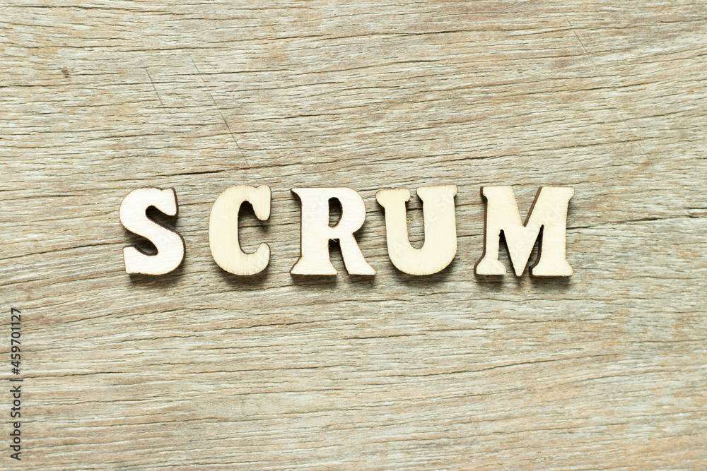 Alphabet letter in word scrum on wood background Alphabet letter in word scrum on wood background