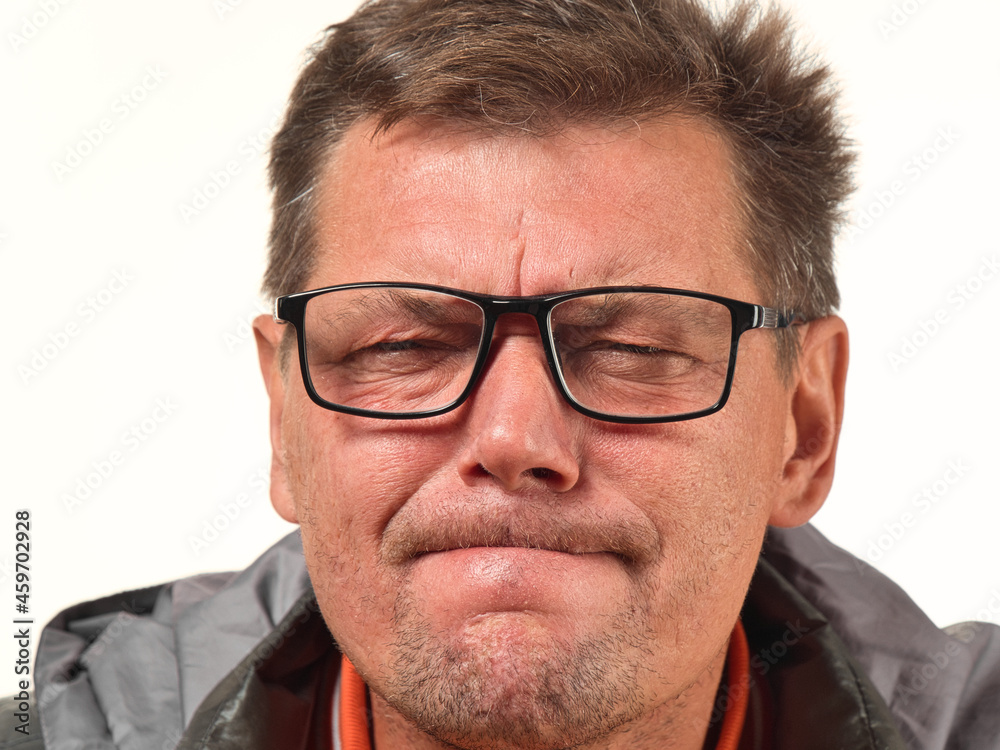 old not shaved man in glasses with facial expressions close-up old not shaved man in glasses with facial expressions close-up
