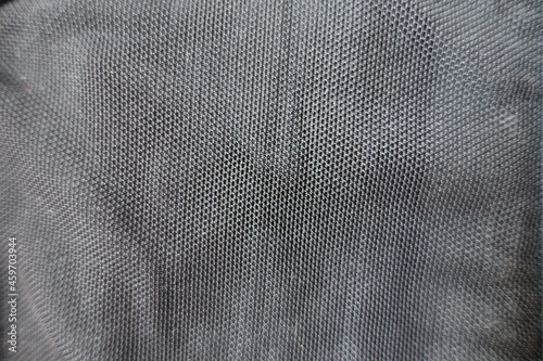 View of simple thin black mesh fabric from above