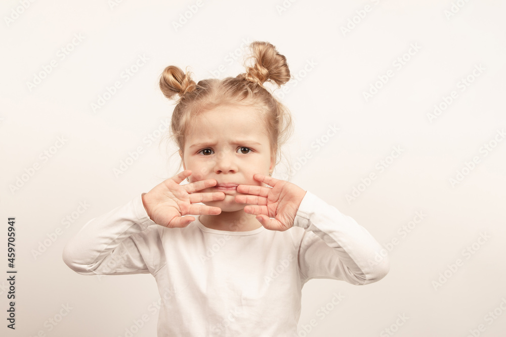 Beautiful little girl, the light background Beautiful little girl, the light background