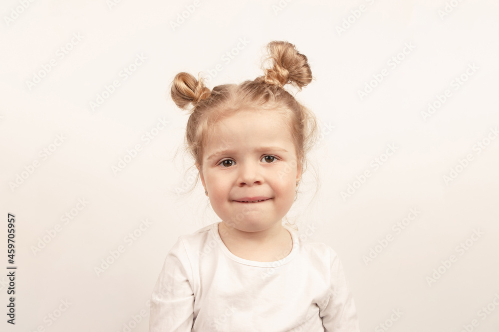 Beautiful little girl, the light background Beautiful little girl, the light background