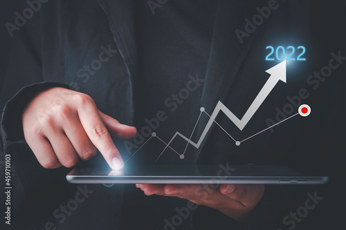 2021 business finance technology and investment concept. Stock Market Investments Funds and Digital Assets. Businessman plan and increase of positive indicators in his business, Growing up business.