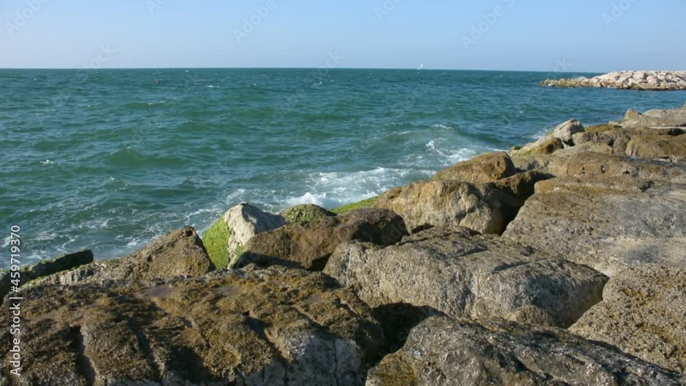 sea waves brakes on stones sea waves brakes on stones