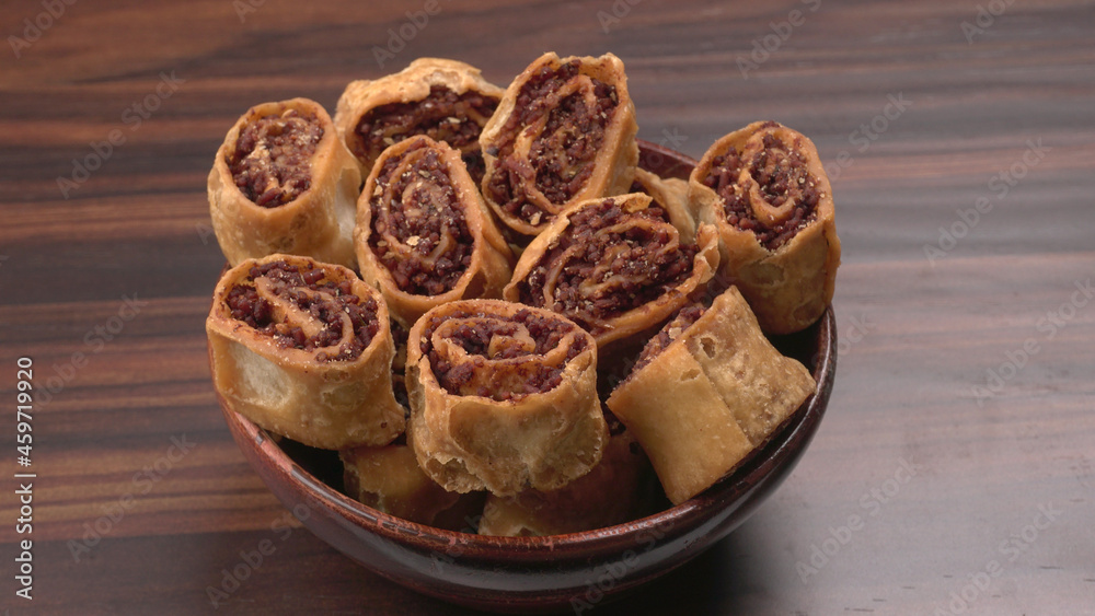 Indian traditional Snacks Bhakarvadi or Bakarvadi.Diwali snacks Bhakarwadi, selective focus