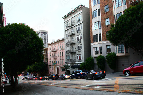 Historic buildings on Powell Street with large slope near Bush Street in city of San Francisco, California CA, USA. 