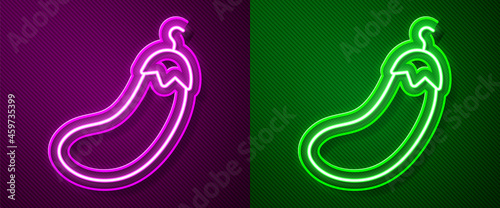 Glowing neon line Eggplant icon isolated on purple and green background. Vector